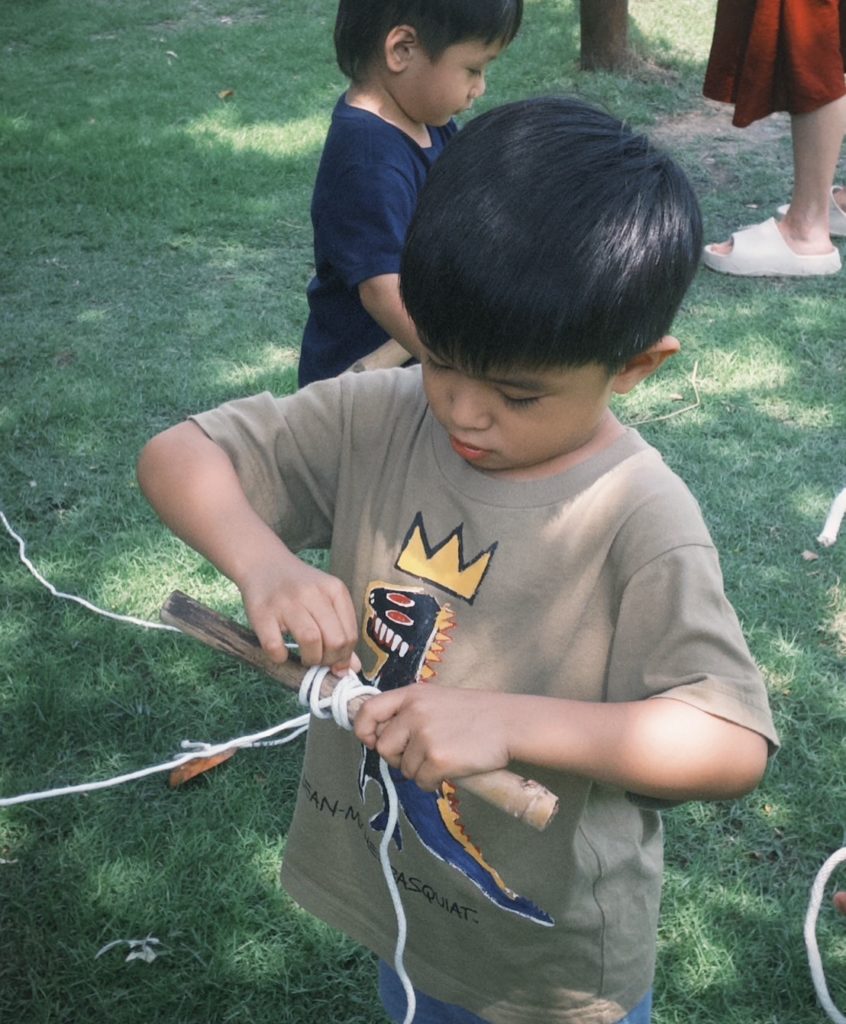 Children crafting item during a small-group activity at Firefly Forest School’s low-ratio school in Bangkok.8